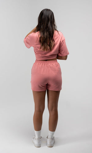 HER PINK SHORTS