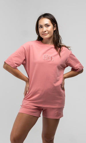 HER PINK T-SHIRT