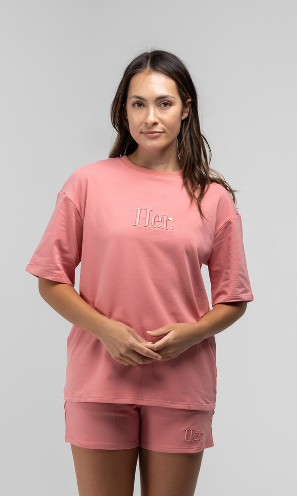 HER PINK T-SHIRT